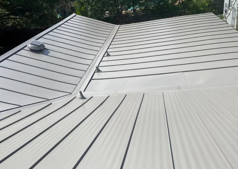 Solar attic fan installed on a metal roof for Roof Ventilation in Gold River